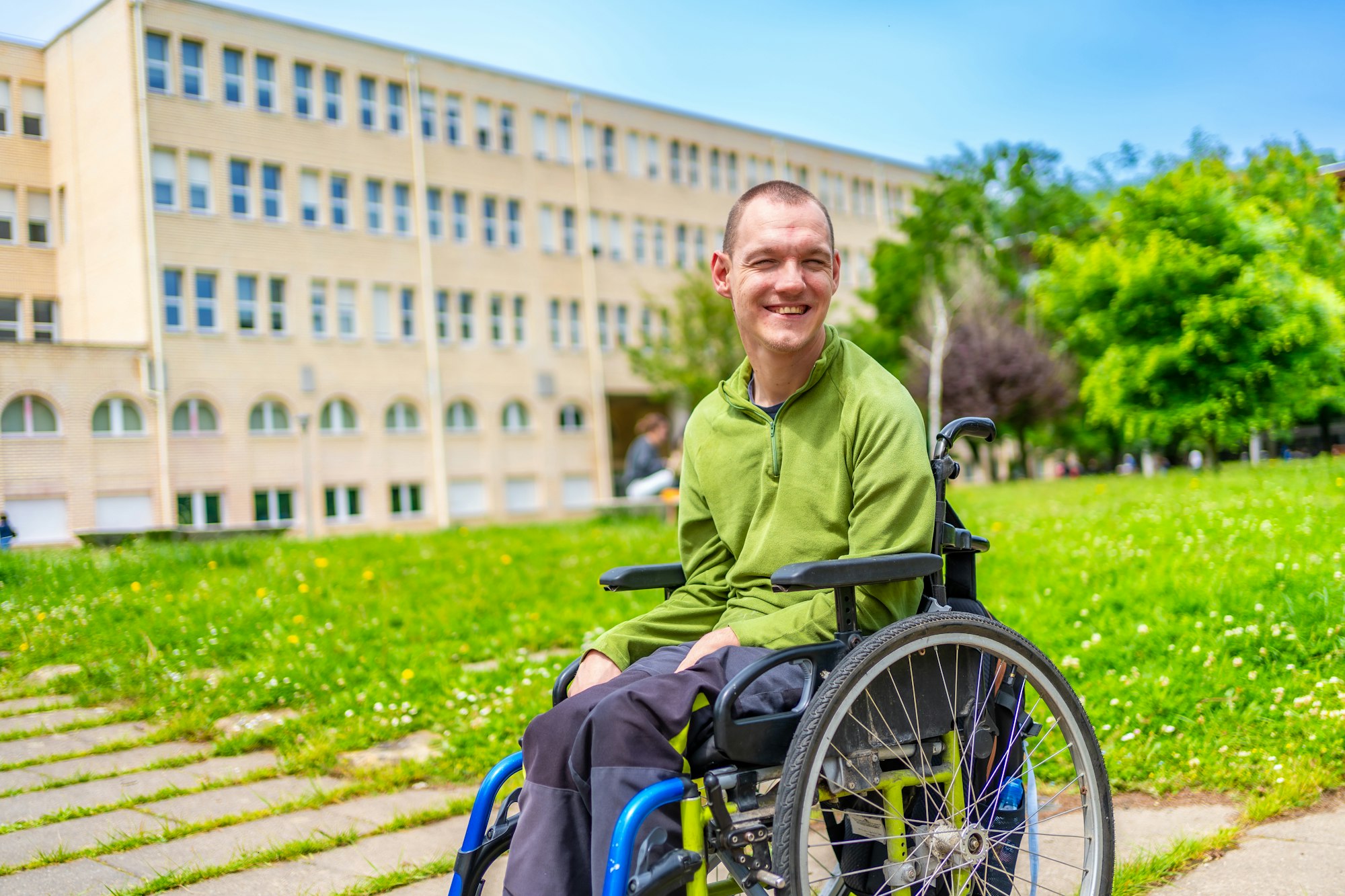 Man with disability in the university campus